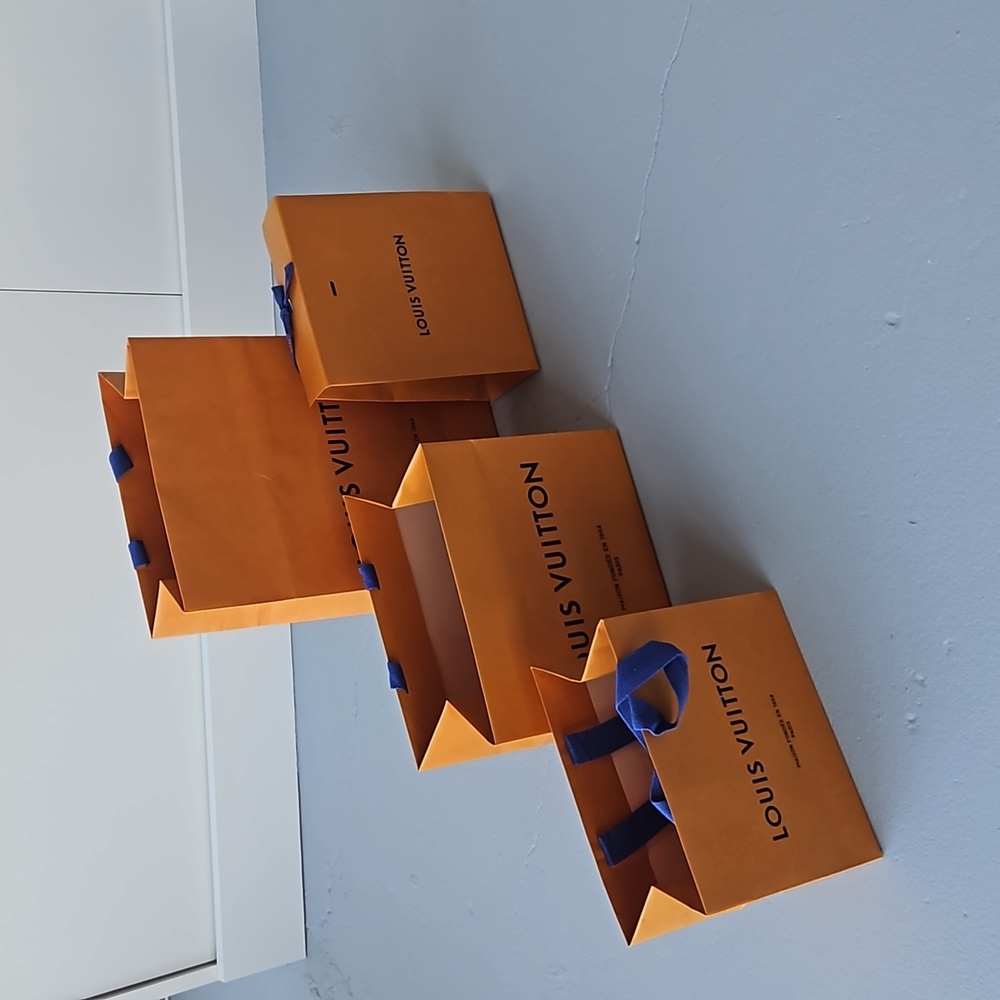 Set of Louis Vuitton shopping bags